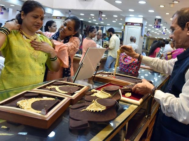 Jewellers hope to sail through festive season on discounts, demand revival by Business Standard